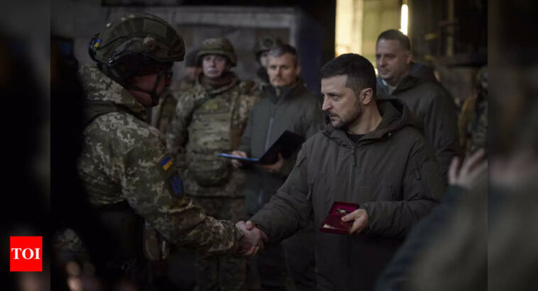 Ukraine's president visits combat zone; Putin rallies forces