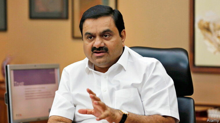 2D0N97D Indian billionaire Gautam Adani speaks during an interview with Reuters at his office in the western Indian city of Ahmedabad April 2, 2014. The way billionaire Indian infrastructure-builder Adani sees it, working with the government does not make him a crony-capitalist. Adani's rapid ascent to the top tier of Indian business is often associated with the rise of Narendra Modi, the Hindu nationalist opposition leader widely expected to become India's next prime minister once the country's election ends next month. Its flagship Adani Enterprises soared 22.9 percent for its biggest daily gain on