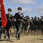 China's military threatens Taiwan takeover in music video