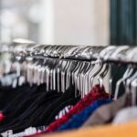 close up of hangers on a clothes rack