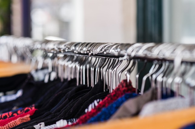 close up of hangers on a clothes rack