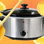 Feeling under the weather? Make a batch of this comforting slow cooker drink Sliced lemons background pattern isolated flay lay