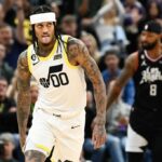 Jordan Clarkson #00 of the Utah Jazz celebrates a three point play during the first half of a game against the LA Clippers at Vivint Arena on November 30, 2022 in Salt Lake City, Utah.