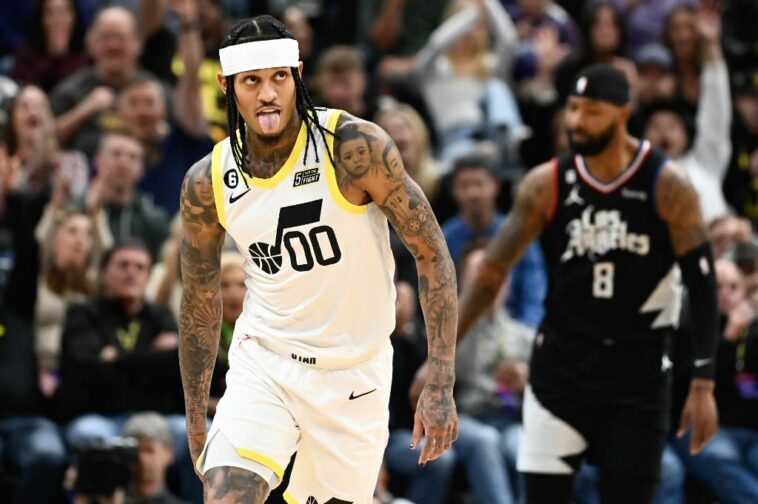 Jordan Clarkson #00 of the Utah Jazz celebrates a three point play during the first half of a game against the LA Clippers at Vivint Arena on November 30, 2022 in Salt Lake City, Utah.