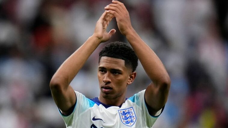 England's Jude Bellingham applauds the fans at the end of the World Cup round of 16 soccer match between England and Senegal, at the Al Bayt Stadium in Al Khor, Qatar, Sunday, Dec. 4, 2022. England won 3-0. (AP Photo/Manu Fernandez)