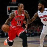 Chicago Bulls' US' power forward DeMar Derozan fights against Detroit Pistons' US' forward Saddiq Bey during the 2023 NBA Paris Games basketball match between Detroit Bulls and Chicago Pistons at the Arena stadium in Paris on January 19, 2023. (Photo by Anne-Christine POUJOULAT / AFP