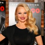 NEW YORK, NEW YORK - MARCH 23: Pamela Anderson poses during a photo call for her Broadway debut in