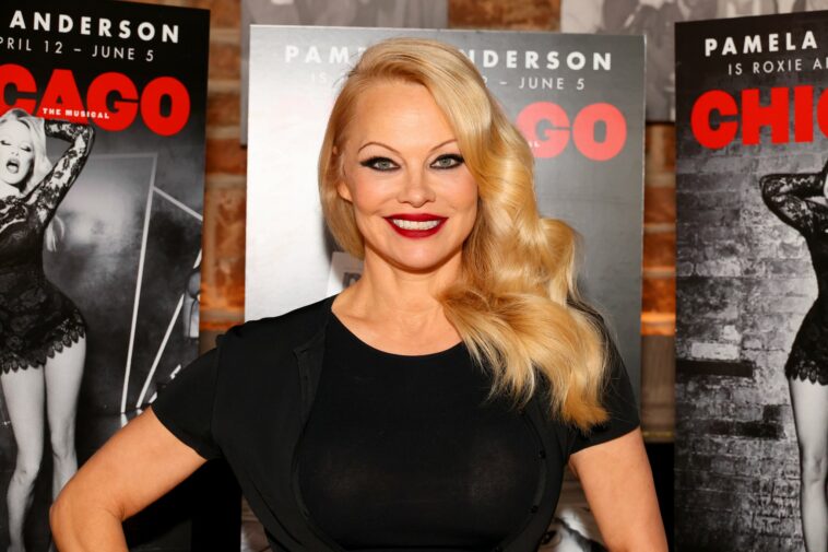 NEW YORK, NEW YORK - MARCH 23: Pamela Anderson poses during a photo call for her Broadway debut in