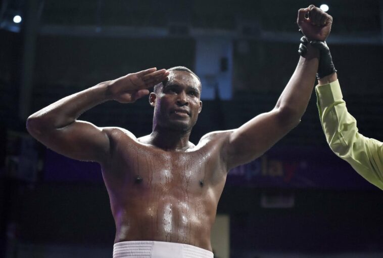 Cuban heavyweight boxer Julio Cesar La Cruz celebrates his victory against Colombian boxer Deivis Casseres during their boxing match in Aguascalientes, Aguascalientes State, Mexico on May 20, 2022. -