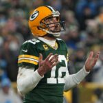 Aaron Rodgers emerges from darkness retreat