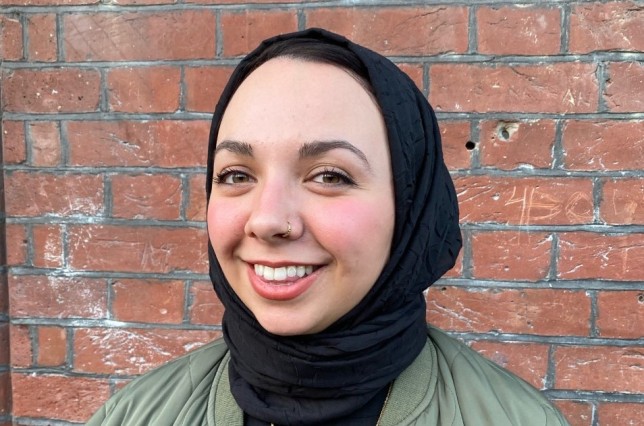 Nadeine Asbali, a young women with a black hijab and with a nose piercing