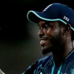 England's bowler Jofra Archer leaves the field after taking the winning wicket of South Africa's batsman Tabraiz Shamsi during the third One-Day International cricket match between South Africa and England at the Kimberley Oval in Kimberley, South Africa, Wednesday, Feb. 1, 2023. (AP Photo/Themba Hadebe)