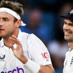 England's Stuart Broad, second right, celebrates with teammates after taking the wicket of New Zealand's Devon Conway on the third day of their cricket test match in Tauranga, New Zealand, Saturday, Feb. 18, 2023. (Andrew Cornaga/Photosport via AP)