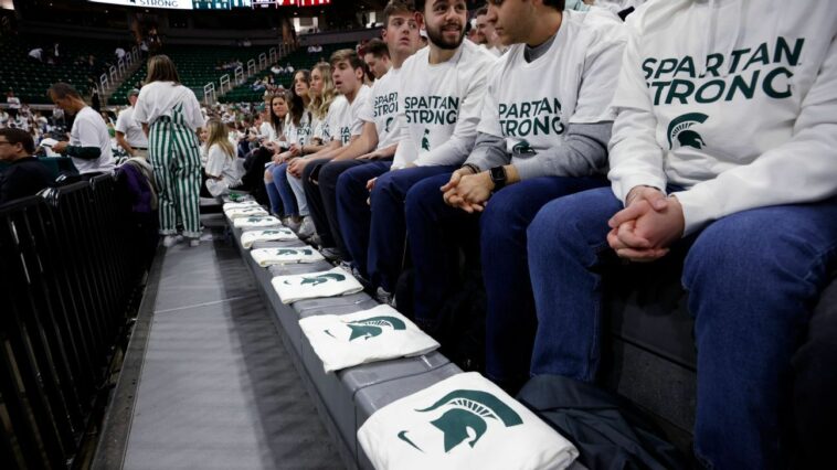 Spartans win in emotional return to home court