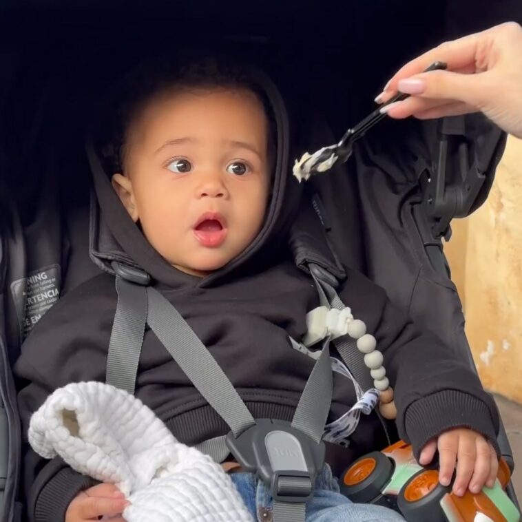 Watch Kylie Jenner and Travis Scott's Son Aire Taste His "First Ice Cream" at Disneyland - E! Online