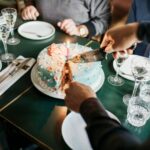 Birthday Cake Being Served In Restaurant