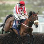 Sam Twiston-Davies and The Real Whacker jump the last in the Brown Advisory Novices' Chase