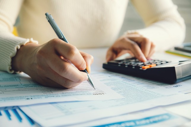 Woman calculating her bills