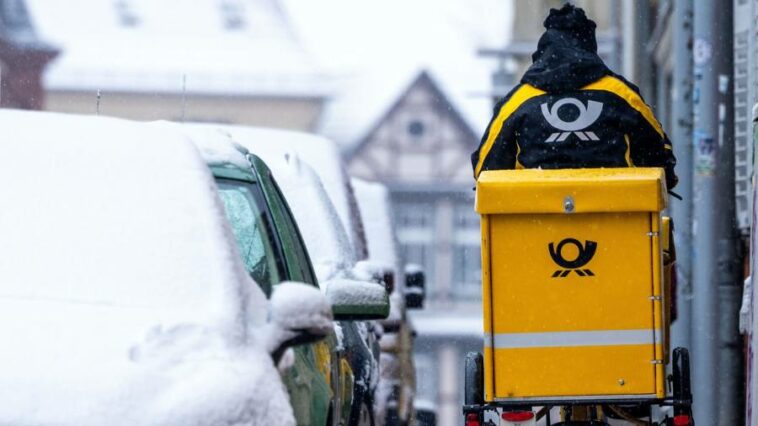 German postal workers given double-digit pay rise to avert strike