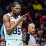 Kevin Durant #35 of the Phoenix Suns reacts in the second quarter during their game against the Charlotte Hornets at Spectrum Center on March 01, 2023 in Charlotte, North Carolina.