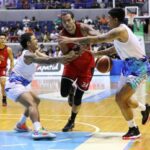 Ginebra big man Christian Standhardinger against Phoenix defenders. –PBA IMAGES