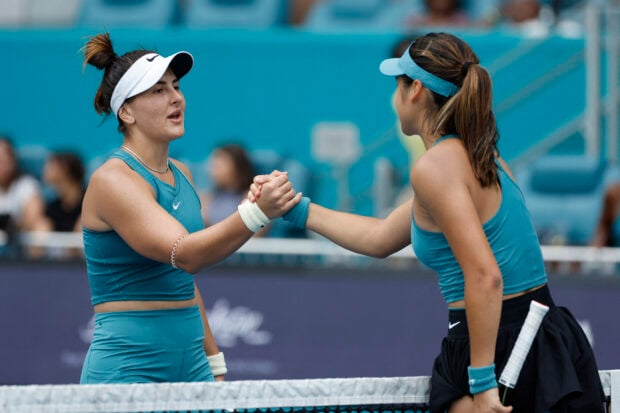 Mar 22, 2023; Miami, Florida, US; Bianca Andreescu (CAN) (L) shakes hands with Emma Raducanu (GBR) (R) after their match on day three of the Miami Open at Hard Rock Stadium. Mandatory Credit: Geoff Burke-USA TODAY Sports