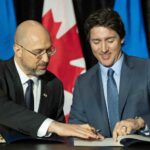 Canada's PM Trudeau provides more Ukraine aid, dismisses site being down