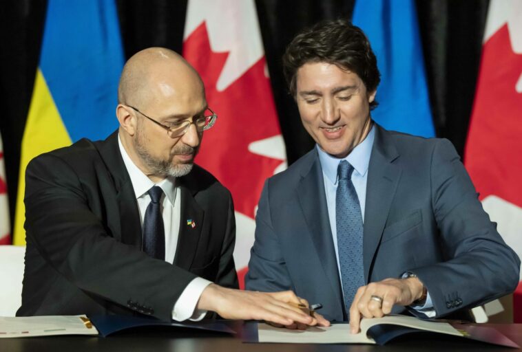 Canada's PM Trudeau provides more Ukraine aid, dismisses site being down