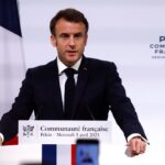 France’s Macron heckled by protesters on Netherlands visit