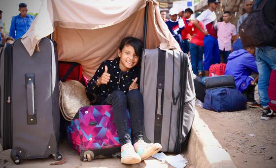 A Venezuelan girl waits at a reception centre in Pacaraima, a city in northern Brazil that lies across the Venezuelan border.