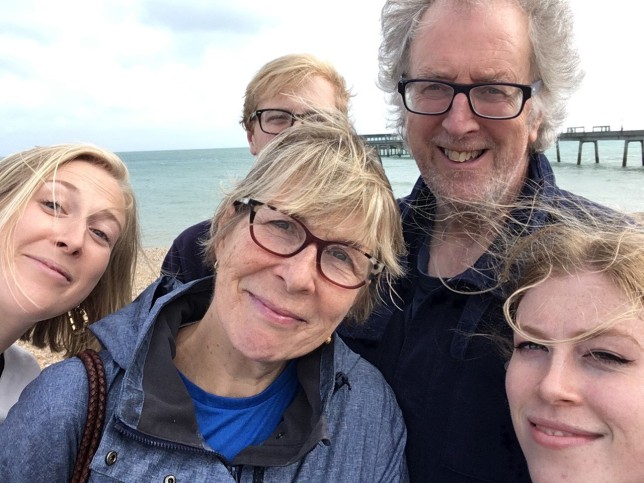 Jules Middleton with her family, including her dad, by the sea.