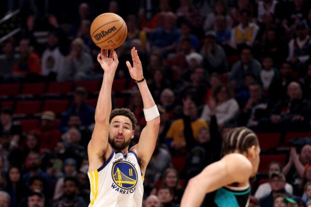 Klay Thompson #11 of the Golden State Warriors shoots during the first quarter against the Portland Trail Blazers at Moda Center on April 09, 2023 in Portland, Oregon. NOTE TO USER: User expressly acknowledges and agrees that, by downloading and/or using this Photograph, user is consenting to the terms and conditions of the Getty Images License Agreement. Steph Chambers/Getty Images/AFP (Photo by Steph Chambers / GETTY IMAGES NORTH AMERICA / Getty Images via AFP)