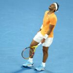 (FILES) In this file photo taken on January 18, 2023 Spain's Rafael Nadal reacts as he competes against Mackenzie McDonald of the US during his men's singles match on day three of the Australian Open tennis tournament in Melbourne.