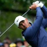 Brooks Koepka leads the way at The Masters following the suspension of play on Saturday