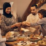 Muslim family celebrating with food