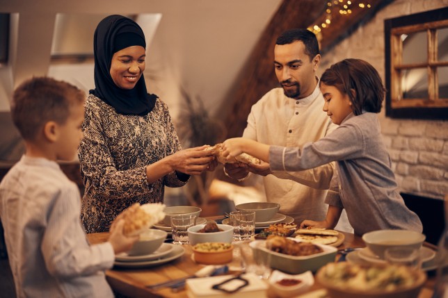 Muslim family celebrating with food