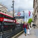 Parliament Street showing a double decker bus and entrance to Westminster Underground station.