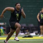 Defensive lineman Jordon Riley runs during Oregon Pro Day at the Moshofsky Center Tuesday March 14, 2023.

Eug 031423 Pro Day 03