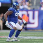 Jan 1, 2023; East Rutherford, New Jersey, USA; New York Giants defensive tackle Dexter Lawrence (97) celebrates a defensive stop during the second half against the Indianapolis Colts at MetLife Stadium.