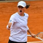 Poland's Iga Swiatek celebrates after defeating Croatia's Donna Vekic in their round of 16 match of the Women's WTA Rome Open tennis tournament on May 16, 2023 at Foro Italico in Rome.