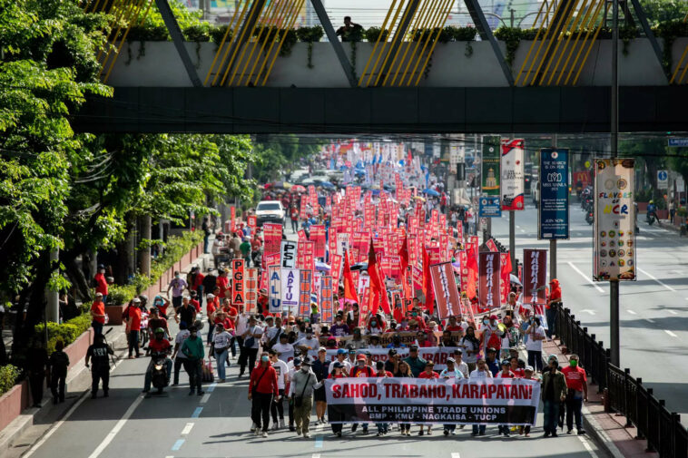 On May Day, workers rally for better labour conditions