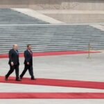 Russian Prime Minister Mikhail Mishustin (L) and Chinese Premier Li Qiang attend a welcoming ceremony in Beijing, China, 24 May 2023.