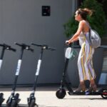 Why cities continue to have a love-hate affair with e-scooters