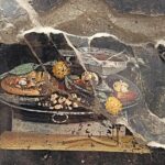 A Proto-Pizza Emerges from a Fresco on a Pompeii Wall