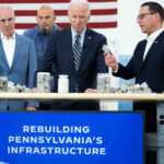 As Trump Battles Charges, Biden Focuses on the Business of Governing