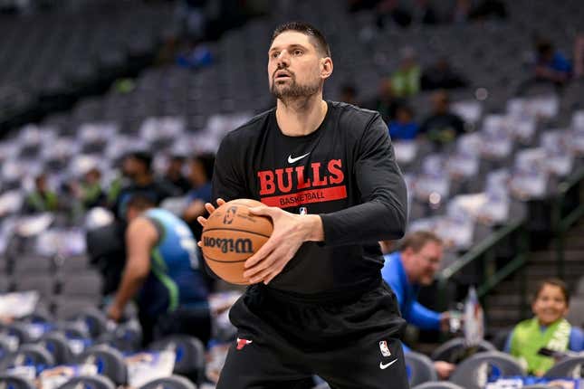 Apr 7, 2023; Dallas, Texas, USA; Chicago Bulls center Nikola Vucevic (9) warms up before the game against the Dallas Mavericks at the American Airlines Center.