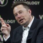 Elon Musk says Tesla's market cap is directly tied to whether it solves autonomous driving