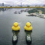 Giant rubber duck floating in Hong Kong as part of artist's globetrotting installation deflates