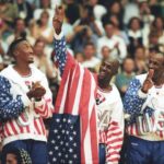 U.S. basketball player Michael Jordan (2nd R) flashes a victory sign as he stands with team mates Larry Bird (L), Scottie Pippen and Clyde Drexler (R), nicknamed the "Dream Team" after winning the Olympic gold in Barcelona, Spain on August 8, 1992.   REUTERS/Ray Stubblebine/File Photo