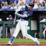 Jun 2, 2023; Kansas City, Missouri, USA; Kansas City Royals center fielder Drew Waters (6) hits a solo home run against the Colorado Rockies in the third inning at Kauffman Stadium.